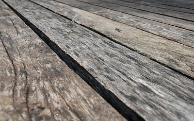 Uneven rustic wood planks close up